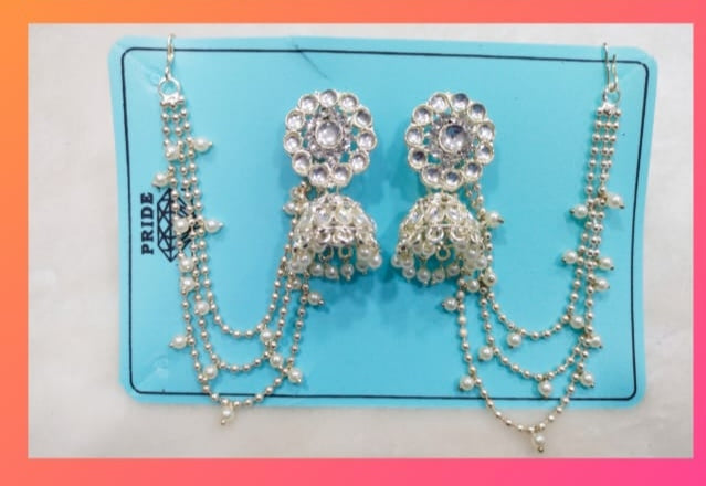 Heirloom Elegance: Kundan-Pearl Jhumkas with Bahubali Multi-Chain Accent