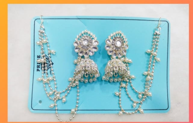 Heirloom Elegance: Kundan-Pearl Jhumkas with Bahubali Multi-Chain Accent