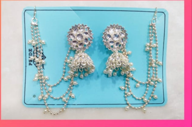 Heirloom Elegance: Kundan-Pearl Jhumkas with Bahubali Multi-Chain Accent